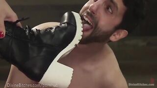 Muscular dominatrix wrestles her slave boy hard