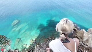 The cute girl passionately sucks her ex-boyfriend's big dick on the shore