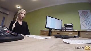A business woman needs a loan and she is willing to do anything for it