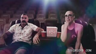 The girl is alone in the theater and she’s playing with herself