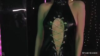 Skinny teen AngelQ strips on stage wearing black lingerie and high heels