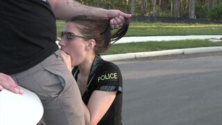 A cop in a sexy female uniform takes control of the situation