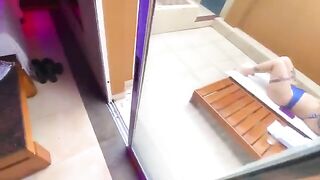 A red-haired girl in a bikini has sex with the employee right in the office
