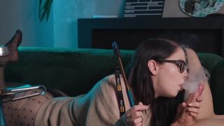 Nerdy girl in glasses smokes and sucks dick while getting her pussy eaten in 69 position