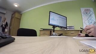 A business lady is trying to get a loan from the bank for her company
