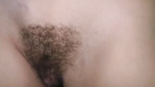 A cute girl with red lips kisses her roommate's big cock passionately
