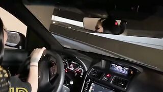 Slutty chick fucks in the car and sucks cock in the parking lot