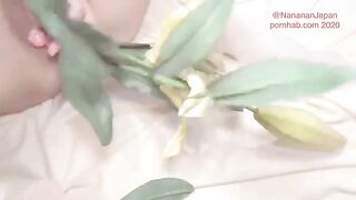 Bukkake with flowers in the ass of a Japanese girl