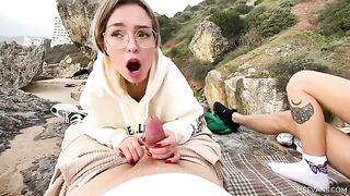 Two young girls are having fun with guys on the beach