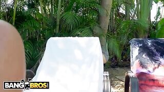 Julianna Vega shakes big tits in oil by the pool