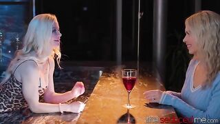The bartender, a stunning blonde, seduced the girl and they got intimate