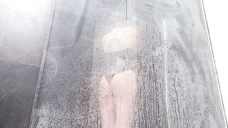 Masturbates to squirting orgasm in shower