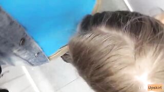 The petite girl was nearly caught while sucking cock in the changing room