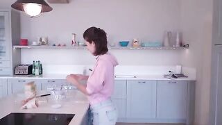 I cooked and undressed at a friend's house, showcasing my sensual side in the kitchen