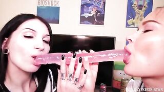 Lesbian beauties play with their nice pussy using a double-end dildo