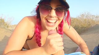 A girl is flashing her body on the beach at night