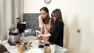 Two girlfriends have a rest while cooking syrniki together