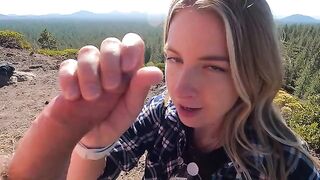 Blonde makes a blowjob on the top of the mountain