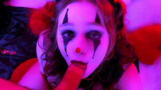 The face of the clown is covered with sperm after sex