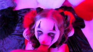 The face of the clown is covered with sperm after sex