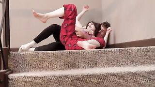 A stepsister is teasing her stepbrother, leading to a hot encounter on the stairs