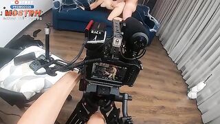 Behind the scene with a blonde and her fake boobs