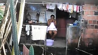 A black girl did not know about the hidden camera in the room