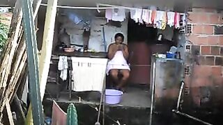 A black girl did not know about the hidden camera in the room