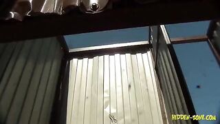 A woman was secretly filmed in a beach cabin, showcasing intimate moments