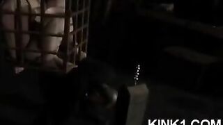 The slave in the cage fulfills all orders of his master
