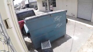 A girl was photographed while having sex behind the garbage tank