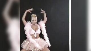 The sexy Russian girl is dancing and stripping eroticly