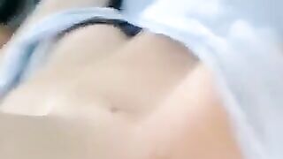 A half-naked girl tells a lie and caresses her body