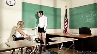 A girl is being fucked by her lesbian teacher on the table