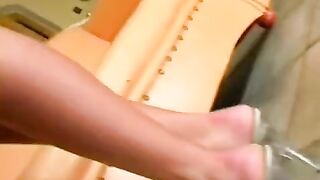 A beauty has sex with her leather chair