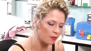 A hot brunette plays with her new clit piercing using a toy