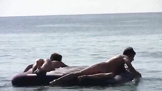 Nude beauties have sex on the beautiful beach