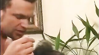 A 40-year-old man playing a joke with a girl through the nipples