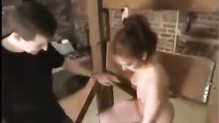 Beautiful girl in bondage, fucked by a man with toys