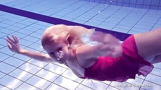 Helen swam naked in the pool, it was a hot day