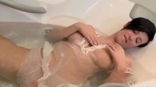 Hot brunette masturbating in the shower stall