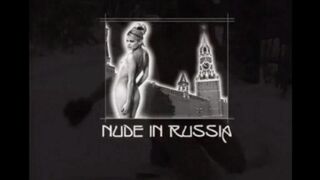 Nude girls have fun with snowballs on the street