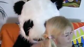 The cute girl was fucked by a bear in the ass