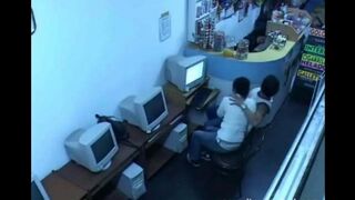 A guy masturbates his cock with webcam in the Internet cafe