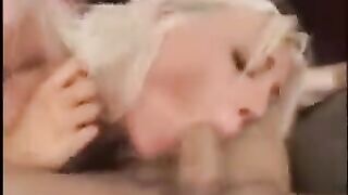 Two guys fuck the ass of a sexy blonde in an intense threesome