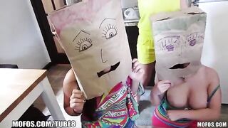 Girls wear bags on their heads for swingers party