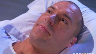 Nurse gave the patient her breast to suck in a hospital setting