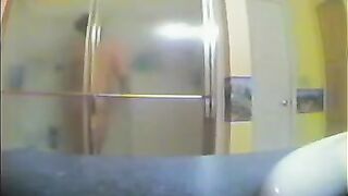 A girl has a shower, not knowing there’s a hidden camera
