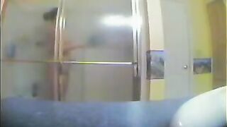 A girl has a shower, not knowing there’s a hidden camera