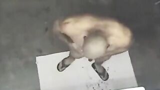 A naked man was seen by a hidden camera in the shower